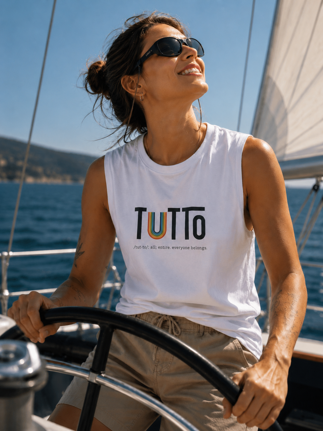 TUTTo  /tùt·to/: all; entire. everyone belongs. - Signature Muscle Tank